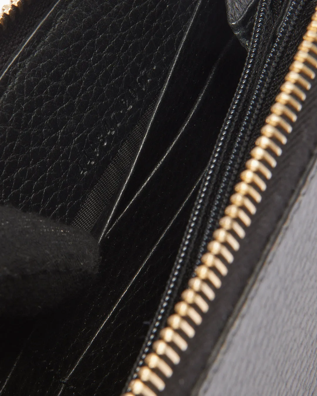 Gucci Black Pebbled Leather Zippy Wallet