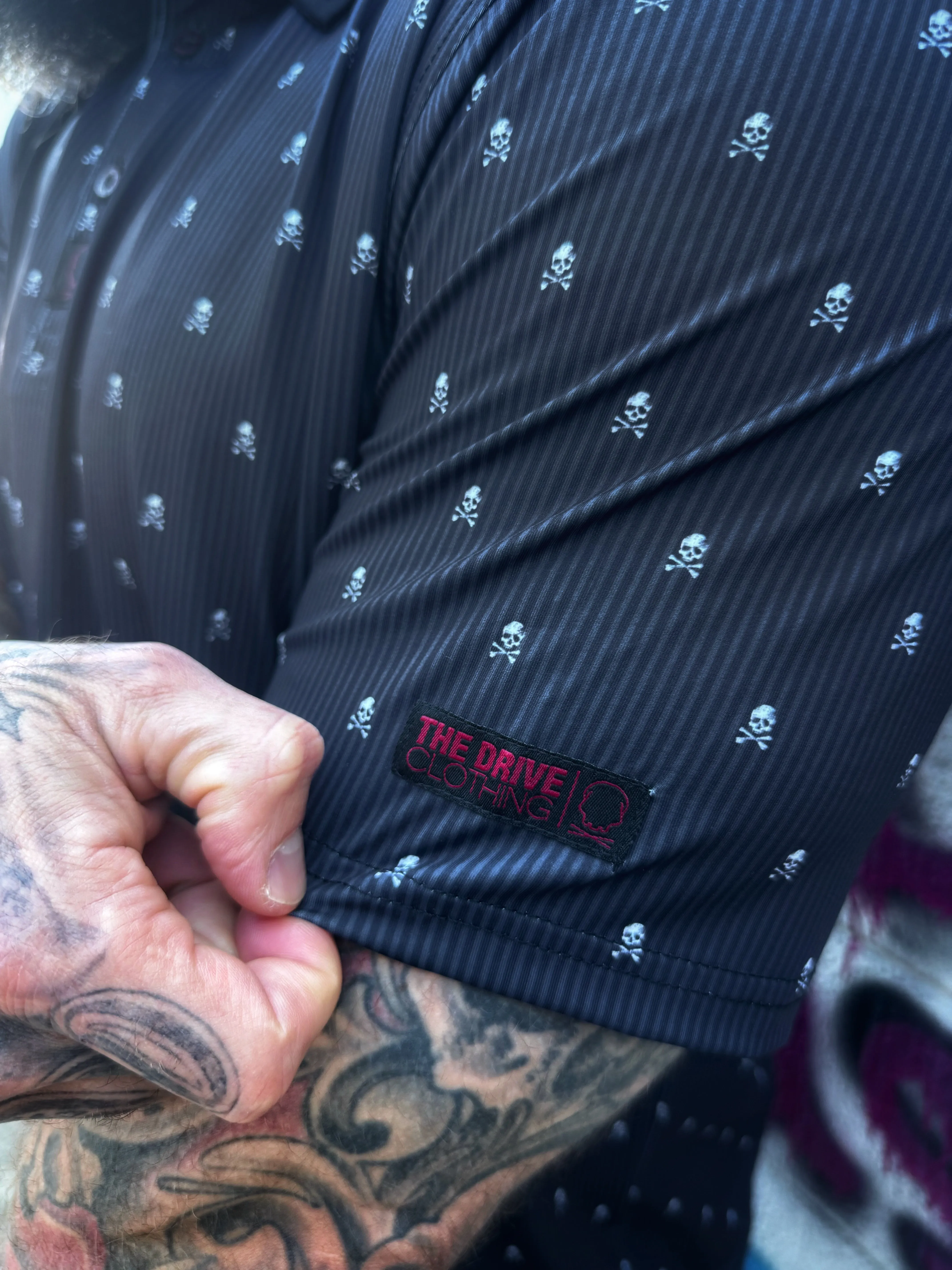 TDC INFINITI SKULL PIN STRIPPED POLO
