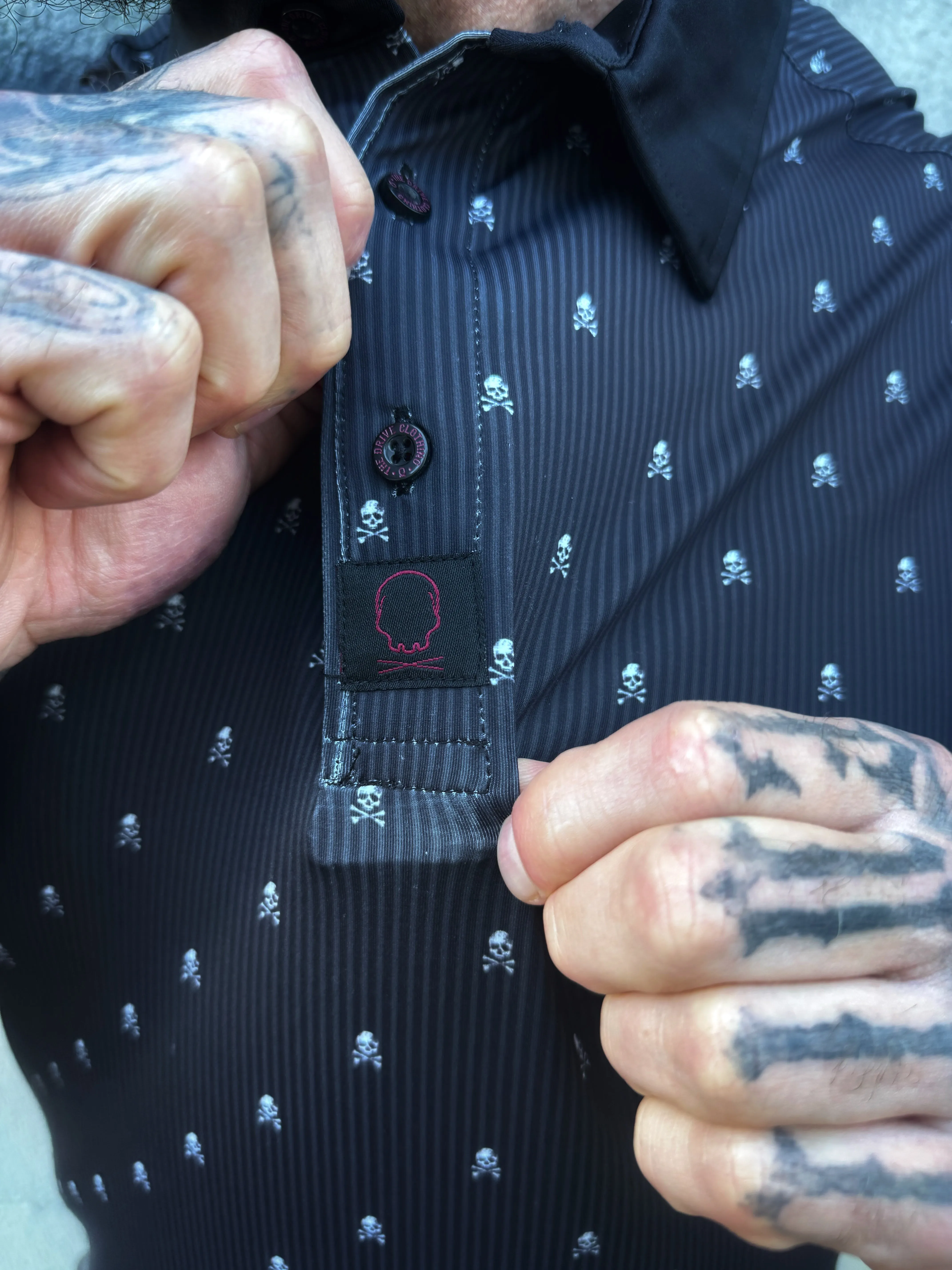 TDC INFINITI SKULL PIN STRIPPED POLO